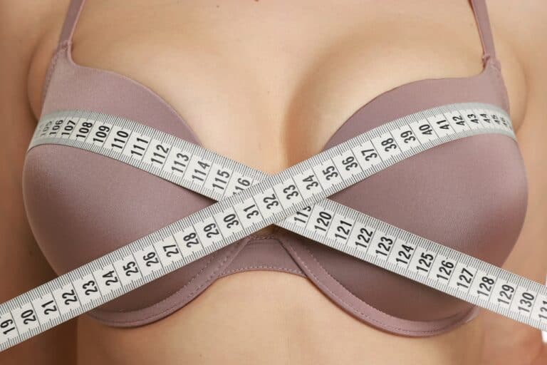 woman in brown elegant bra with tape measure